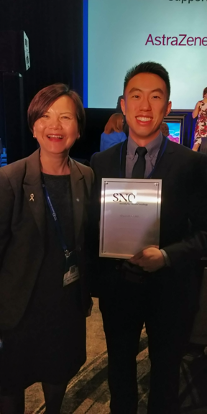 Bryan winning an award at SNO 2019