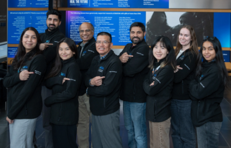 Group photo of Pearson Lab team members wearing lab sweaters at SickKids in 2025.