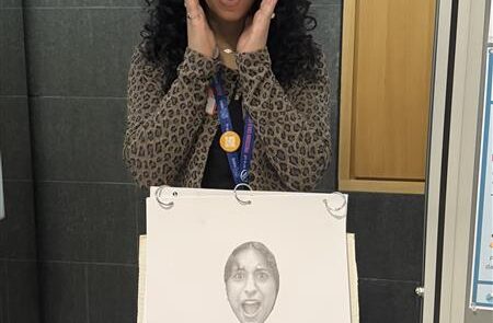 A woman recreates a shocked face above a picture of her shocked face.