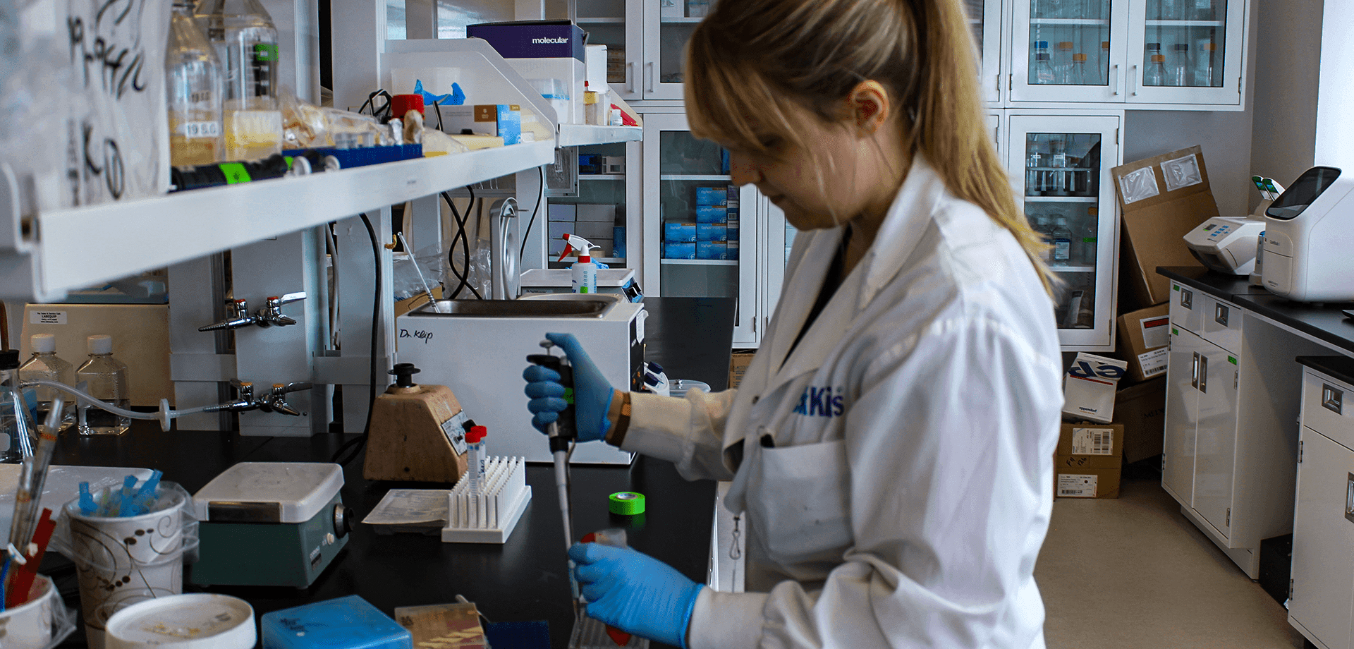 Sarah Chadwick pipetting in the lab