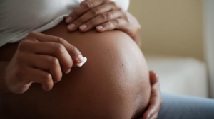 a pregnant woman taking an Aspirin