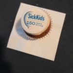 SickKids 150 years strong written over a cupcake