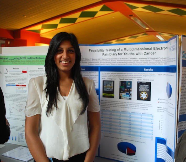 Photo of Tahira Daya poster presentation at the SickKids Summer Research Program (SSuRE) Symposium, Summer 2012