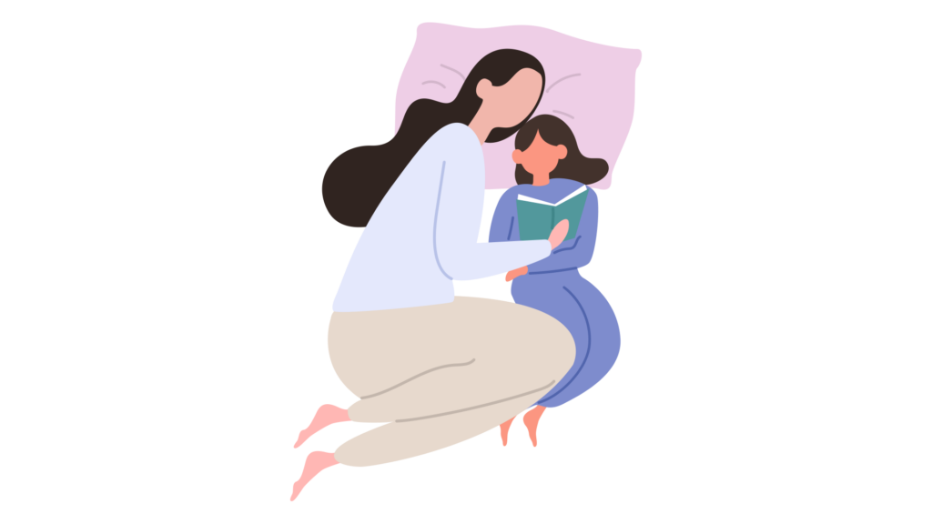 mother and daughter curled together on a pillow reading a book