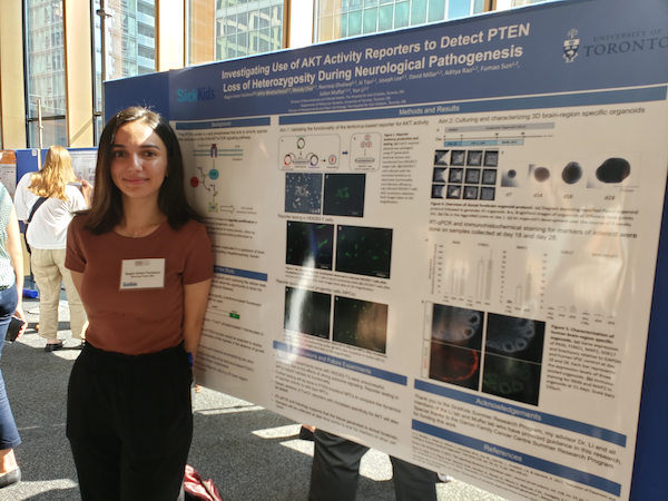 Undergraduate student from Dr. Li's lab presenting her poster at the undergraduate research poster day in summer of 2019