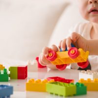 Photo of child playing with lego