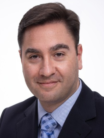 Headshot photo of Eduardo Gus