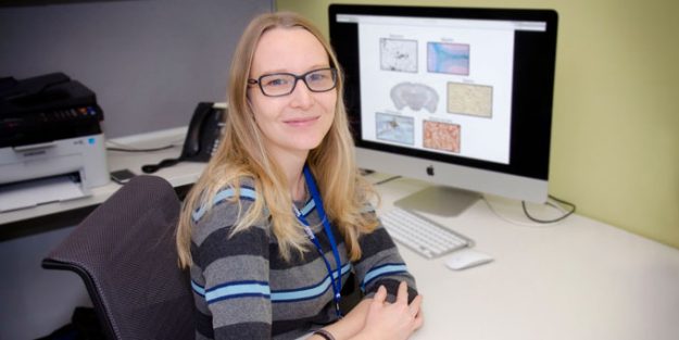 A portrait of Anne, our PI, in her office