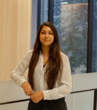 Mahreen Khan headshot in front of window