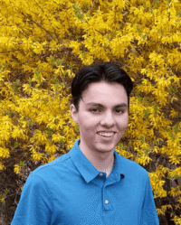 roby (1) Roby in front of flowers